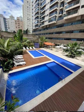 Flat Capitania Varam Guarujá com varanda gourmet